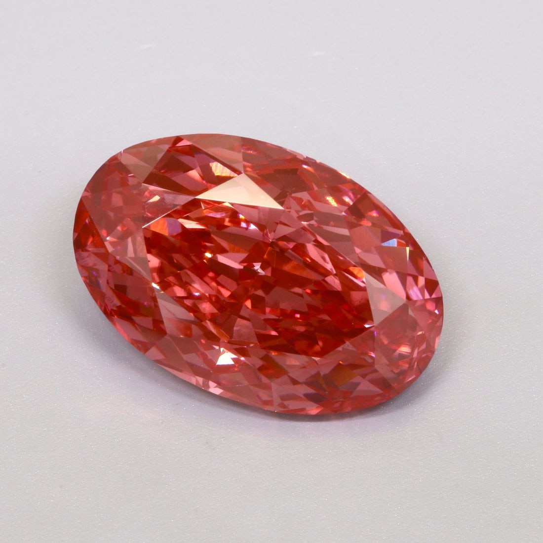 Loose Diamond - OVAL 10.04ct Fancy Vivid Red VS2: Loose Diamond - OVAL 10.04ct Fancy Vivid Red VS2 Source: This is a real non-mined Diamond that has been grown in a lab Shape: OVAL Carats: 10.04 Color: Fancy Vivid Red Certification: IGI Video: