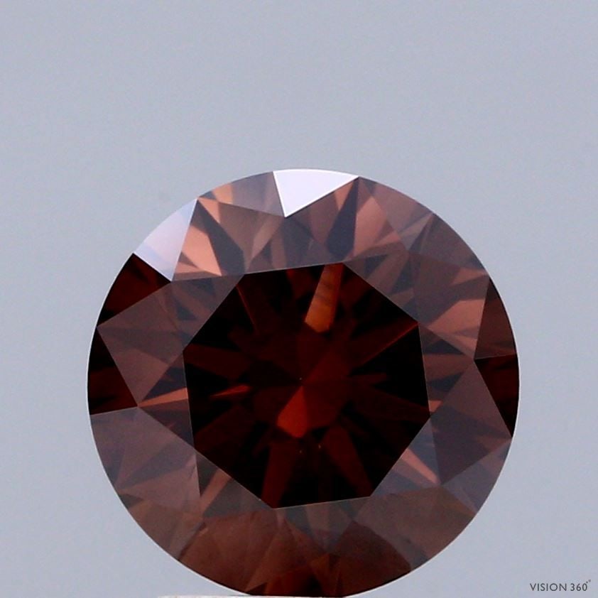 Loose Diamond - ROUND 3.02ct Fancy Deep Brown VVS2: Loose Diamond - ROUND 3.02ct Fancy Deep Brown VVS2 Source: This is a real non-mined Diamond that has been grown in a lab Shape: ROUND Carats: 3.02 Color: Fancy Deep Brown Certification: IGI Video: