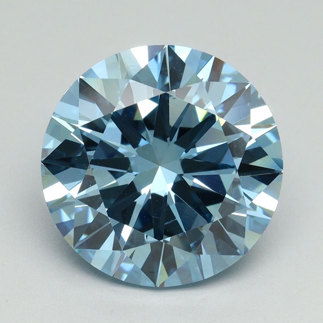 Loose Diamond - ROUND 5.04ct Fancy Vivid Blue VS2: Loose Diamond - ROUND 5.04ct Fancy Vivid Blue VS2 Source: This is a real non-mined Diamond that has been grown in a lab Shape: ROUND Carats: 5.04 Color: Fancy Vivid Blue Certification: IGI Video: