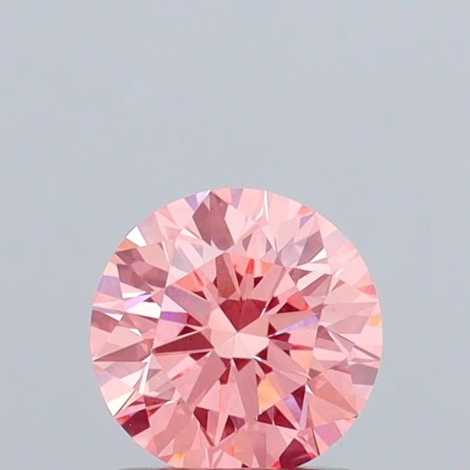 Ideal Loose Diamond - ROUND 1.08ct Fancy Vivid Pink VS1: Ideal Loose Diamond - ROUND 1.08ct Fancy Vivid Pink VS1 Source: This is a real non-mined Diamond that has been grown in a lab Shape: ROUND Carats: 1.08 Color: Fancy Vivid Pink Certification: IGI