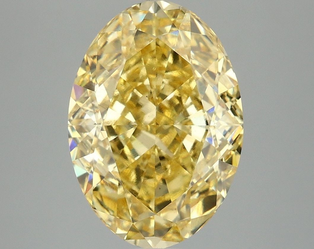 Loose Diamond - OVAL 4.86ct Fancy Vivid Yellow VS1: Loose Diamond - OVAL 4.86ct Fancy Vivid Yellow VS1 Source: This is a real non-mined Diamond that has been grown in a lab Shape: OVAL Carats: 4.86 Color: Fancy Vivid Yellow Certification: IGI Video: