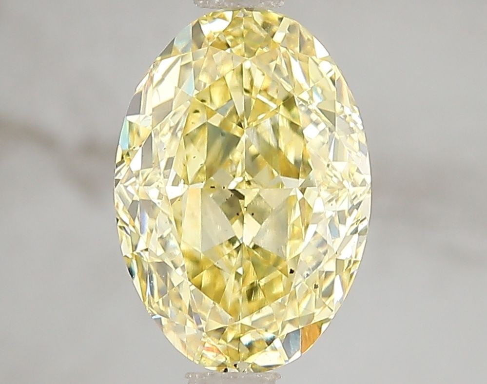 Loose Diamond - OVAL 3.01ct Fancy Vivid Yellow SI1: Loose Diamond - OVAL 3.01ct Fancy Vivid Yellow SI1 Source: This is a real non-mined Diamond that has been grown in a lab Shape: OVAL Carats: 3.01 Color: Fancy Vivid Yellow Certification: IGI Video: