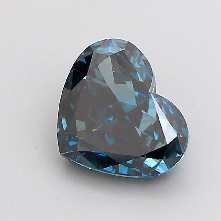 Loose Diamond - HEART 0.93ct Fancy Vivid Blue SI1: Loose Diamond - HEART 0.93ct Fancy Vivid Blue SI1 Source: This is a real non-mined Diamond that has been grown in a lab Shape: HEART Carats: 0.93 Color: Fancy Vivid Blue Certification: IGI Video: