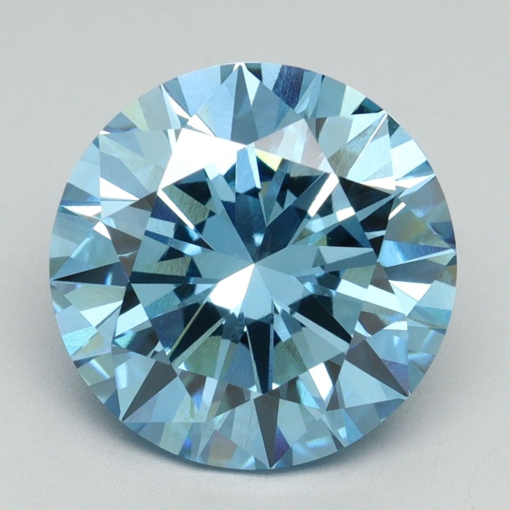 Loose Diamond - ROUND 5.1ct Fancy Vivid Blue VS1: Loose Diamond - ROUND 5.1ct Fancy Vivid Blue VS1 Source: This is a real non-mined Diamond that has been grown in a lab Shape: ROUND Carats: 5.1 Color: Fancy Vivid Blue Certification: IGI Video: Video