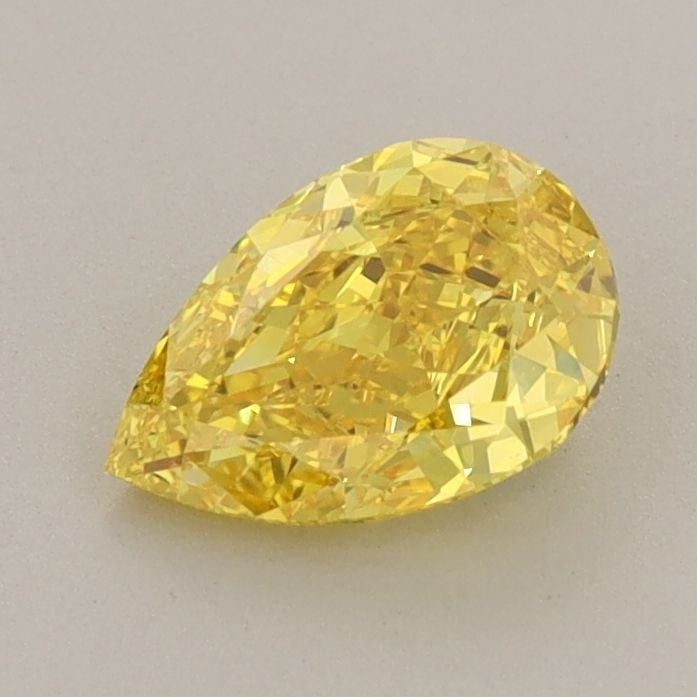 Loose Diamond - PEAR 0.96ct Fancy Vivid Yellow VS1: Loose Diamond - PEAR 0.96ct Fancy Vivid Yellow VS1 Source: This is a real non-mined Diamond that has been grown in a lab Shape: PEAR Carats: 0.96 Color: Fancy Vivid Yellow Certification: IGI Video: