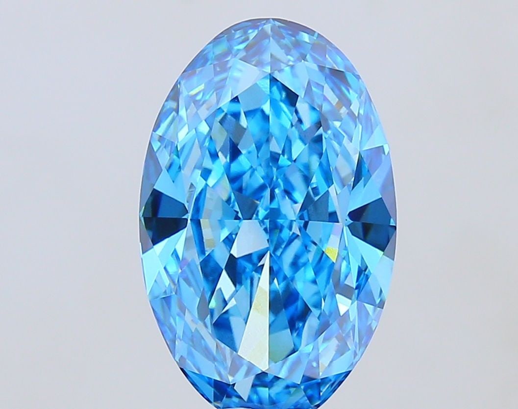 Loose Diamond - OVAL 15.08ct Fancy Vivid Blue VVS2: Loose Diamond - OVAL 15.08ct Fancy Vivid Blue VVS2 Source: This is a real non-mined Diamond that has been grown in a lab Shape: OVAL Carats: 15.08 Color: Fancy Vivid Blue Certification: IGI Video:
