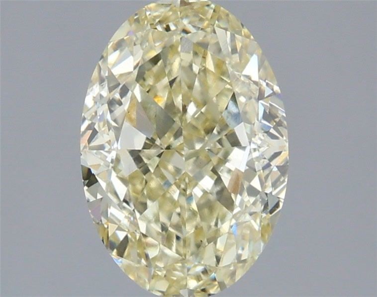 Loose Diamond - OVAL 2.08ct Fancy Light Yellow VS1: Loose Diamond - OVAL 2.08ct Fancy Light Yellow VS1 Source: This is a real non-mined Diamond that has been grown in a lab Shape: OVAL Carats: 2.08 Color: Fancy Light Yellow Certification: IGI Video: