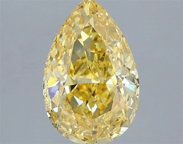 Loose Diamond - PEAR 2.03ct Fancy Vivid Yellow VS1: Loose Diamond - PEAR 2.03ct Fancy Vivid Yellow VS1 Source: This is a real non-mined Diamond that has been grown in a lab Shape: PEAR Carats: 2.03 Color: Fancy Vivid Yellow Certification: IGI Video:
