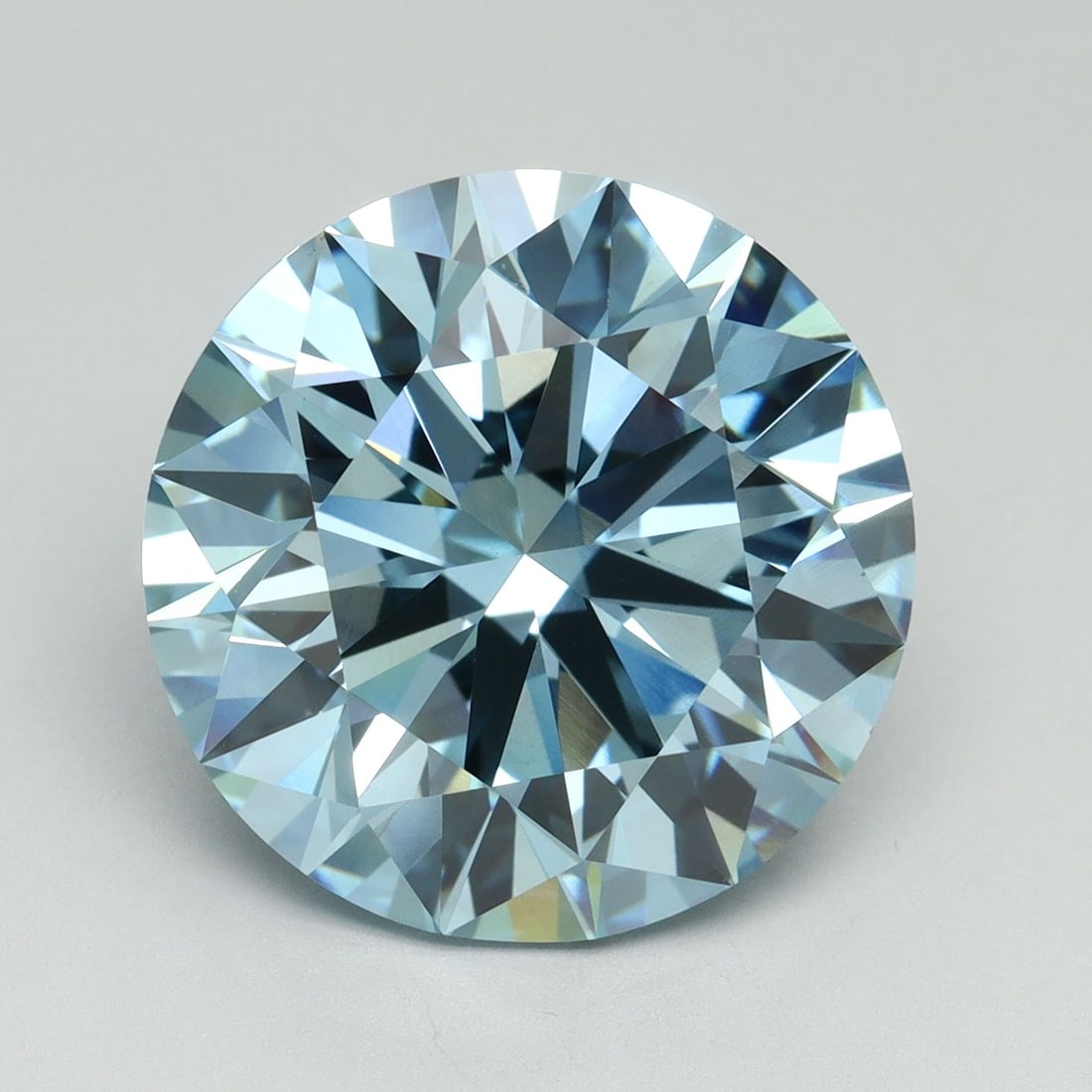 Ideal Loose Diamond - ROUND 9.66ct Fancy Vivid Blue VS1: Ideal Loose Diamond - ROUND 9.66ct Fancy Vivid Blue VS1 Source: This is a real non-mined Diamond that has been grown in a lab Shape: ROUND Carats: 9.66 Color: Fancy Vivid Blue Certification: IGI Video