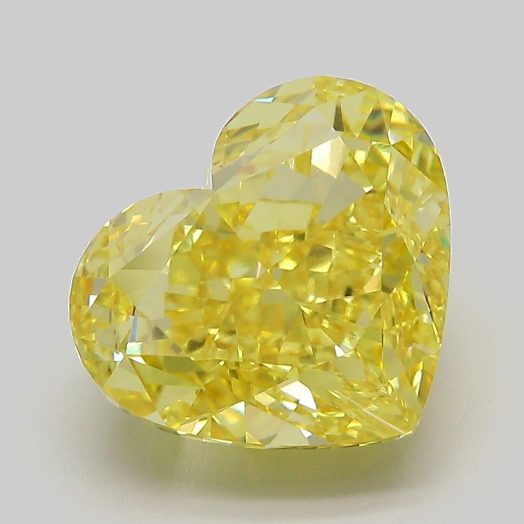 Loose Diamond - HEART 6.57ct Fancy Vivid Yellow VVS2: Loose Diamond - HEART 6.57ct Fancy Vivid Yellow VVS2 Source: This is a real non-mined Diamond that has been grown in a lab Shape: HEART Carats: 6.57 Color: Fancy Vivid Yellow Certification: IGI Video: