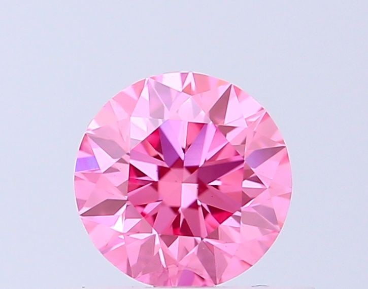 Ideal Loose Diamond - ROUND 0.55ct Fancy Vivid Pink VS1: Ideal Loose Diamond - ROUND 0.55ct Fancy Vivid Pink VS1 Source: This is a real non-mined Diamond that has been grown in a lab Shape: ROUND Carats: 0.55 Color: Fancy Vivid Pink Certification: IGI Video