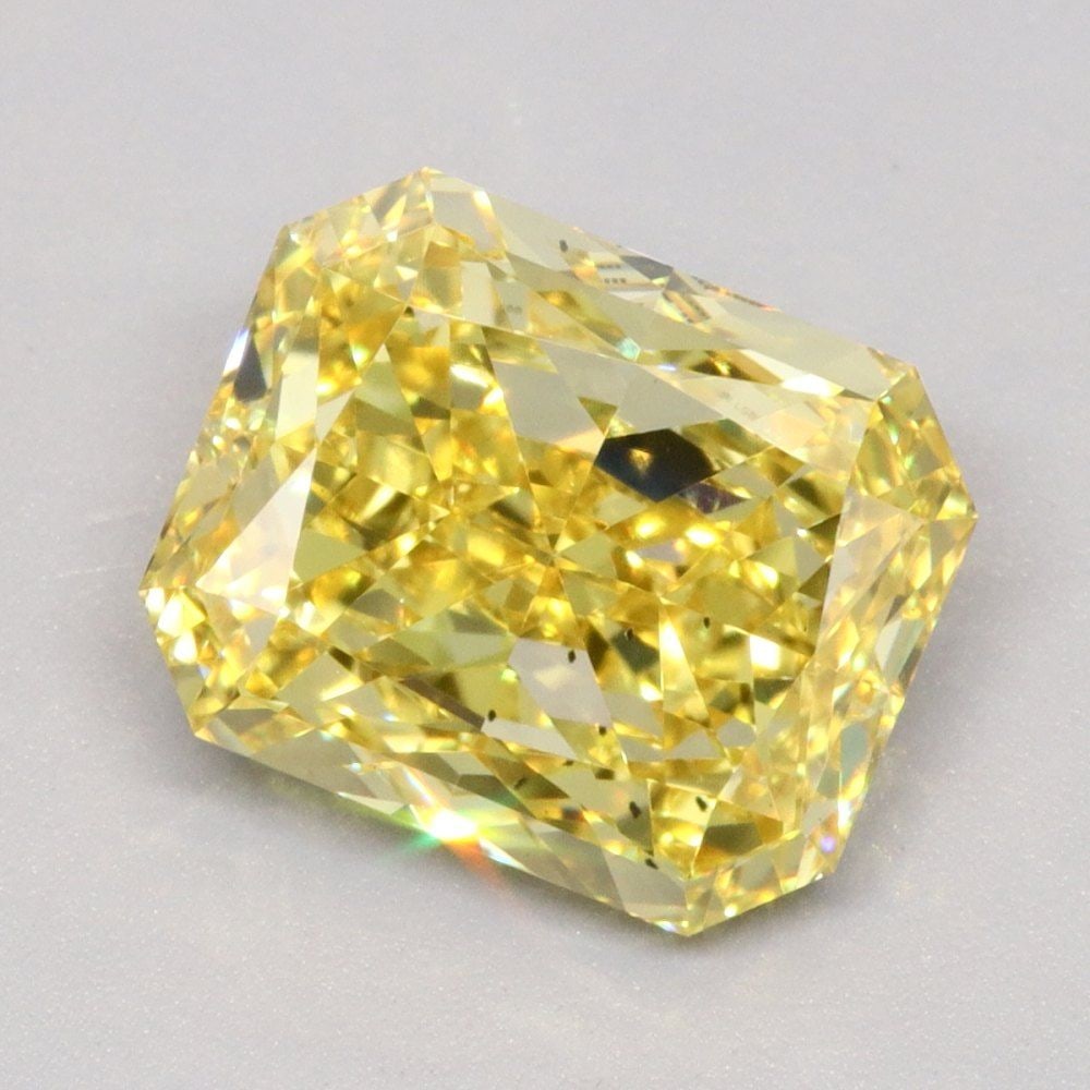 Loose Diamond - RADIANT 2.81ct Fancy Vivid Yellow VS2: Loose Diamond - RADIANT 2.81ct Fancy Vivid Yellow VS2 Source: This is a real non-mined Diamond that has been grown in a lab Shape: RADIANT Carats: 2.81 Color: Fancy Vivid Yellow Certification: IGI Vid