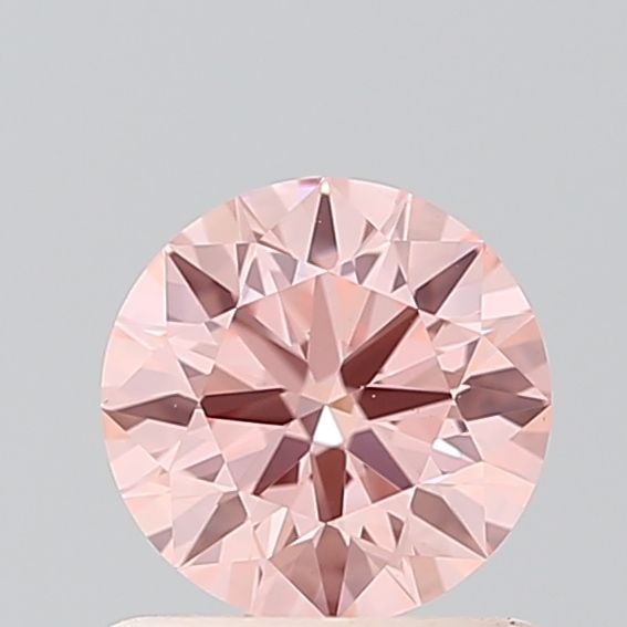 Ideal Loose Diamond - ROUND 0.71ct Fancy Intense Pink VS1: Ideal Loose Diamond - ROUND 0.71ct Fancy Intense Pink VS1 Source: This is a real non-mined Diamond that has been grown in a lab Shape: ROUND Carats: 0.71 Color: Fancy Intense Pink Certification: IGI
