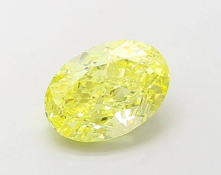 Loose Diamond - OVAL 2.03ct Fancy Vivid Yellow VS2: Loose Diamond - OVAL 2.03ct Fancy Vivid Yellow VS2 Source: This is a real non-mined Diamond that has been grown in a lab Shape: OVAL Carats: 2.03 Color: Fancy Vivid Yellow Certification: IGI Video: