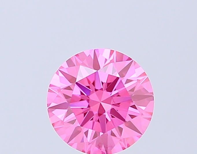 Ideal Loose Diamond - ROUND 1.09ct Fancy Vivid Pink VS1: Ideal Loose Diamond - ROUND 1.09ct Fancy Vivid Pink VS1 Source: This is a real non-mined Diamond that has been grown in a lab Shape: ROUND Carats: 1.09 Color: Fancy Vivid Pink Certification: IGI Video