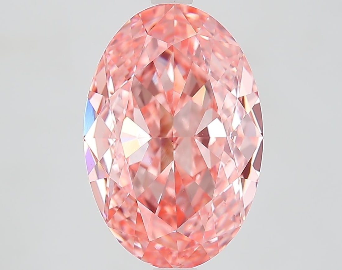 Loose Diamond - OVAL 5.09ct Fancy Vivid Pink VS1: Loose Diamond - OVAL 5.09ct Fancy Vivid Pink VS1 Source: This is a real non-mined Diamond that has been grown in a lab Shape: OVAL Carats: 5.09 Color: Fancy Vivid Pink Certification: IGI Additional im