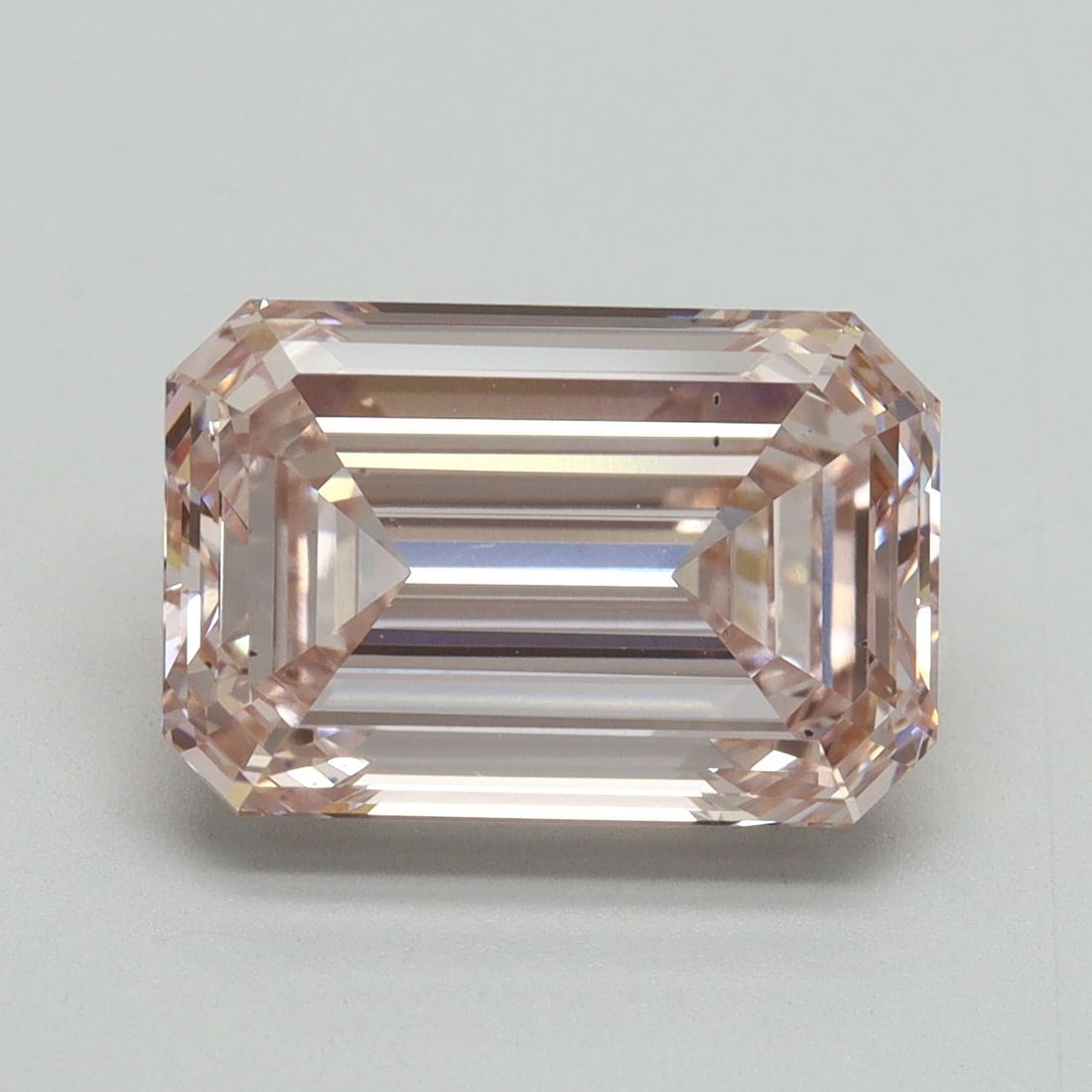 Loose Diamond - EMERALD 5.05ct Fancy Pink VS2: Loose Diamond - EMERALD 5.05ct Fancy Pink VS2 Source: This is a real non-mined Diamond that has been grown in a lab Shape: EMERALD Carats: 5.05 Color: Fancy Pink Certification: IGI Video:
