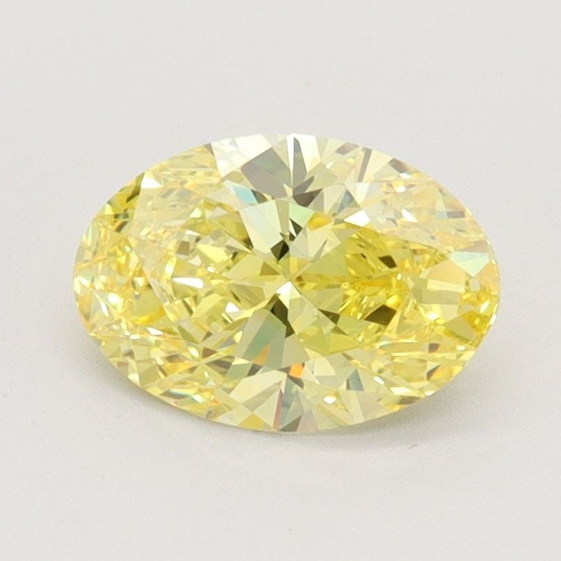 Loose Diamond - OVAL 1.09ct Fancy Vivid Yellow VVS1: Loose Diamond - OVAL 1.09ct Fancy Vivid Yellow VVS1 Source: This is a real non-mined Diamond that has been grown in a lab Shape: OVAL Carats: 1.09 Color: Fancy Vivid Yellow Certification: IGI Video: