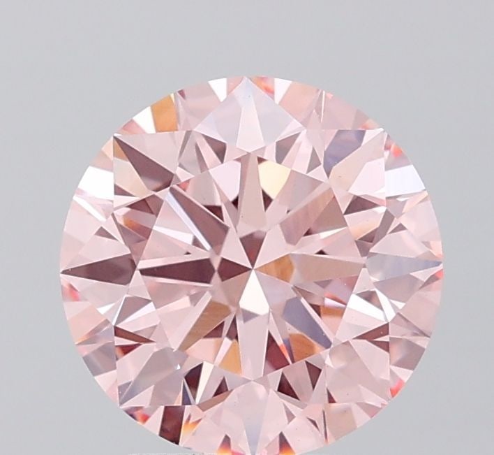 Ideal Loose Diamond - ROUND 2.55ct Fancy Vivid Pink VS1: Ideal Loose Diamond - ROUND 2.55ct Fancy Vivid Pink VS1 Source: This is a real non-mined Diamond that has been grown in a lab Shape: ROUND Carats: 2.55 Color: Fancy Vivid Pink Certification: IGI