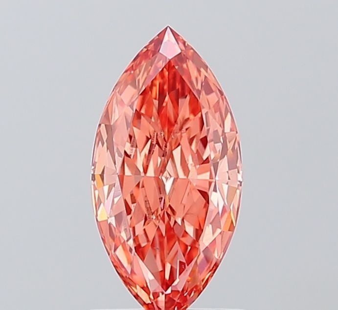 Loose Diamond - MARQUISE 1.09ct Fancy Vivid Orangey Pink VS1: Loose Diamond - MARQUISE 1.09ct Fancy Vivid Orangey Pink VS1 Source: This is a real non-mined Diamond that has been grown in a lab Shape: MARQUISE Carats: 1.09 Color: Fancy Vivid Orangey Pink Certific