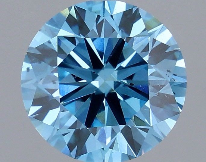 Ideal Loose Diamond - ROUND 2.14ct Fancy Vivid Blue SI1: Ideal Loose Diamond - ROUND 2.14ct Fancy Vivid Blue SI1 Source: This is a real non-mined Diamond that has been grown in a lab Shape: ROUND Carats: 2.14 Color: Fancy Vivid Blue Certification: IGI Video