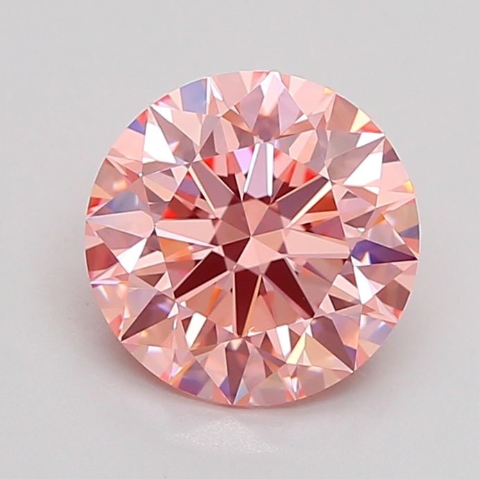Ideal Loose Diamond - ROUND 2.1ct Fancy Vivid Pink VVS2: Ideal Loose Diamond - ROUND 2.1ct Fancy Vivid Pink VVS2 Source: This is a real non-mined Diamond that has been grown in a lab Shape: ROUND Carats: 2.1 Color: Fancy Vivid Pink Certification: IGI Video: