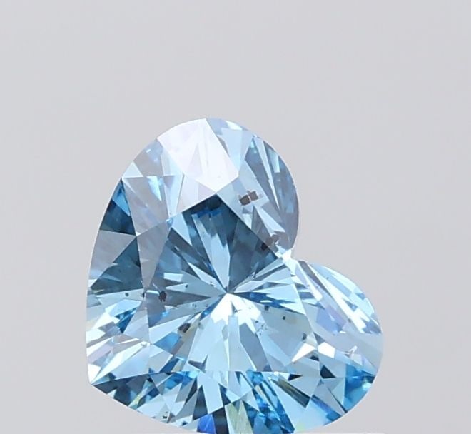 Loose Diamond - HEART 1.1ct Fancy Vivid Blue SI1: Loose Diamond - HEART 1.1ct Fancy Vivid Blue SI1 Source: This is a real non-mined Diamond that has been grown in a lab Shape: HEART Carats: 1.1 Color: Fancy Vivid Blue Certification: NONE Video: