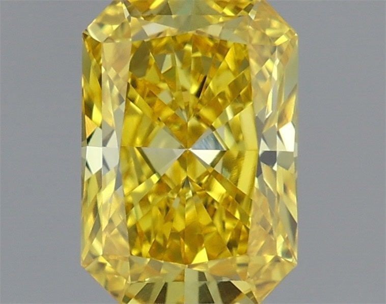 Loose Diamond - RADIANT 0.7ct Fancy Vivid Yellow VVS2: Loose Diamond - RADIANT 0.7ct Fancy Vivid Yellow VVS2 Source: This is a real non-mined Diamond that has been grown in a lab Shape: RADIANT Carats: 0.7 Color: Fancy Vivid Yellow Certification: IGI Vide