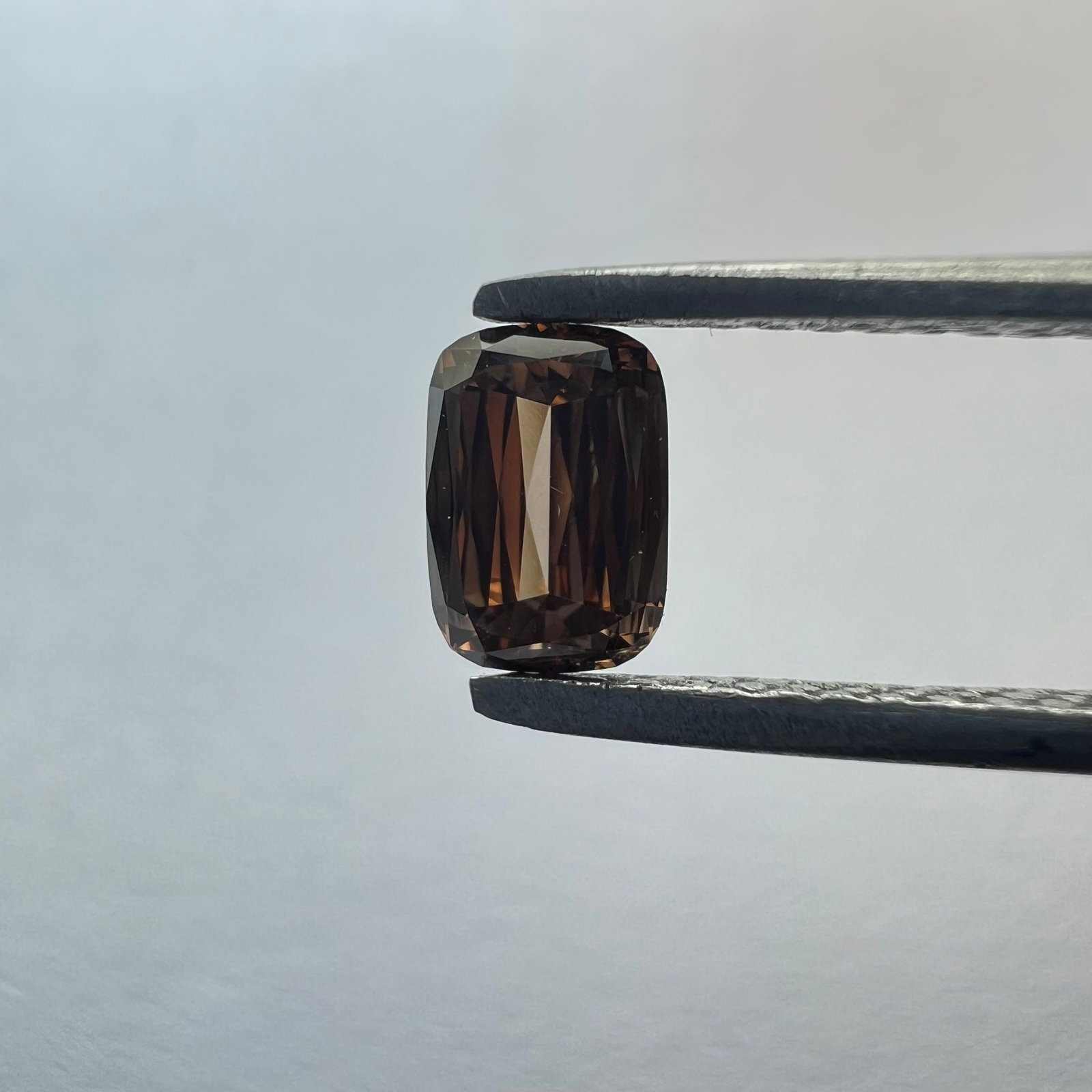 Loose Diamond - CUSHION BRILLIANT 0.42ct Brown VS1: Loose Diamond - CUSHION BRILLIANT 0.42ct Brown VS1 Source: This is a real non-mined Diamond that has been grown in a lab Shape: CUSHION BRILLIANT Carats: 0.42 Color: Brown Certification: NONE Addition