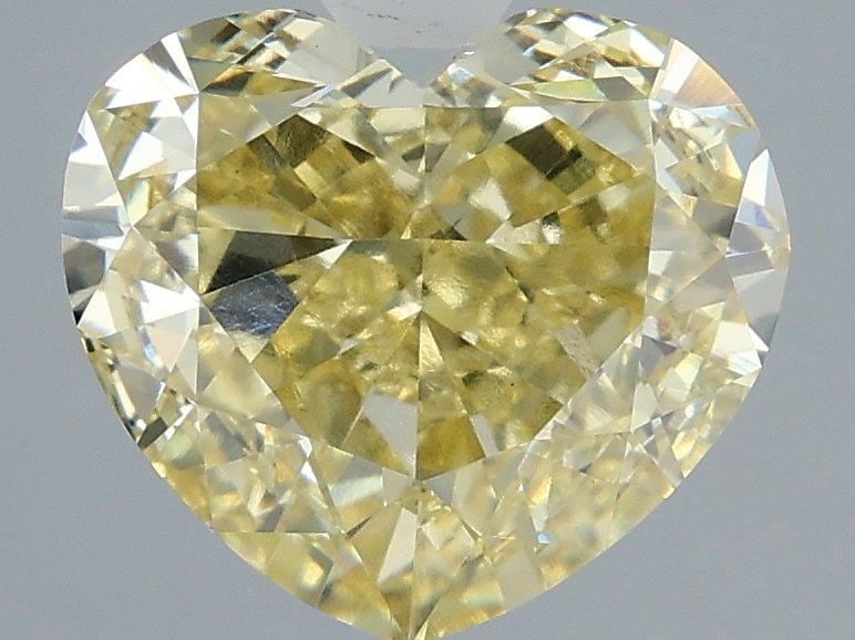 Loose Diamond - HEART 4.05ct Fancy Intense Yellow VVS2: Loose Diamond - HEART 4.05ct Fancy Intense Yellow VVS2 Source: This is a real non-mined Diamond that has been grown in a lab Shape: HEART Carats: 4.05 Color: Fancy Intense Yellow Certification: IGI Vi