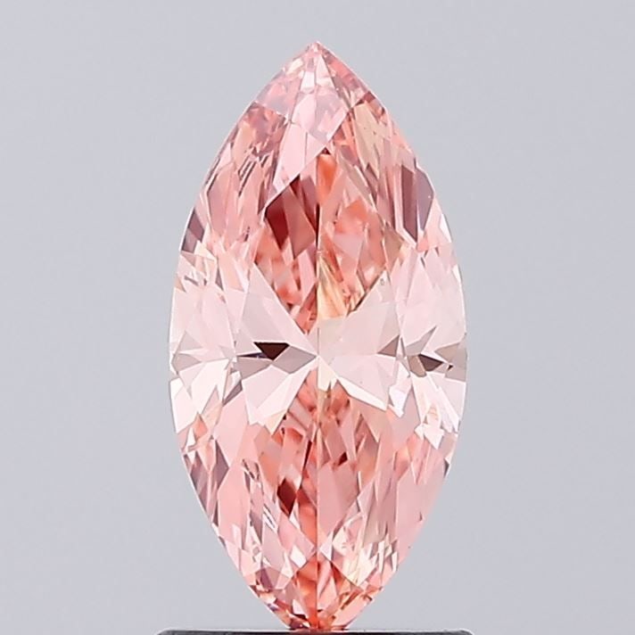 Loose Diamond - MARQUISE 1.12ct Fancy Vivid Pink VS1: Loose Diamond - MARQUISE 1.12ct Fancy Vivid Pink VS1 Source: This is a real non-mined Diamond that has been grown in a lab Shape: MARQUISE Carats: 1.12 Color: Fancy Vivid Pink Certification: IGI Video