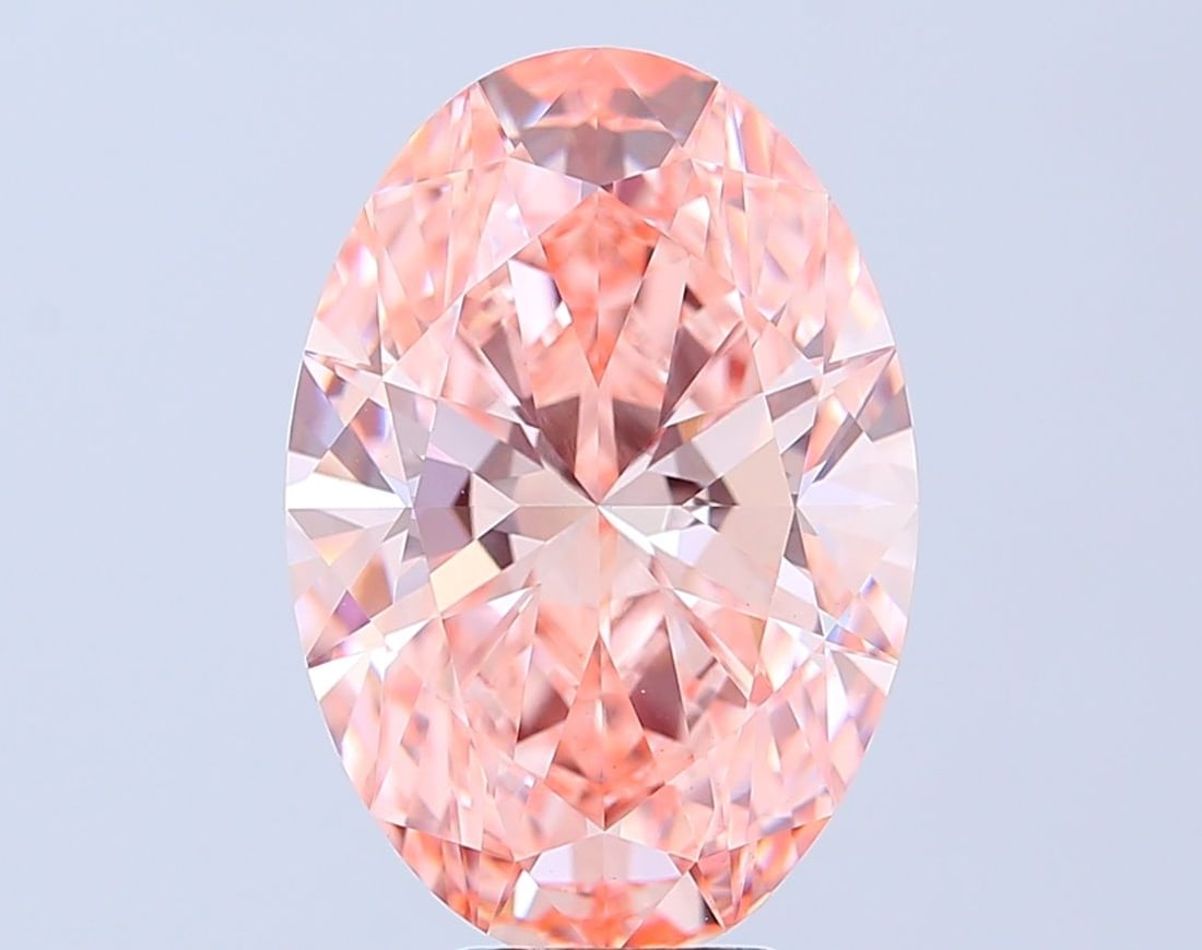 Loose Diamond - OVAL 6.09ct Fancy Vivid Pink VS1: Loose Diamond - OVAL 6.09ct Fancy Vivid Pink VS1 Source: This is a real non-mined Diamond that has been grown in a lab Shape: OVAL Carats: 6.09 Color: Fancy Vivid Pink Certification: IGI Video: