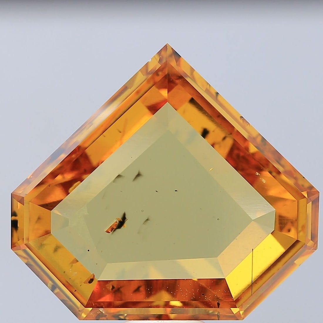 Loose Diamond - SHIELD 12.54ct Fancy Intense Yellow SI1: Loose Diamond - SHIELD 12.54ct Fancy Intense Yellow SI1 Source: This is a real non-mined Diamond that has been grown in a lab Shape: SHIELD Carats: 12.54 Color: Fancy Intense Yellow Certification: IGI