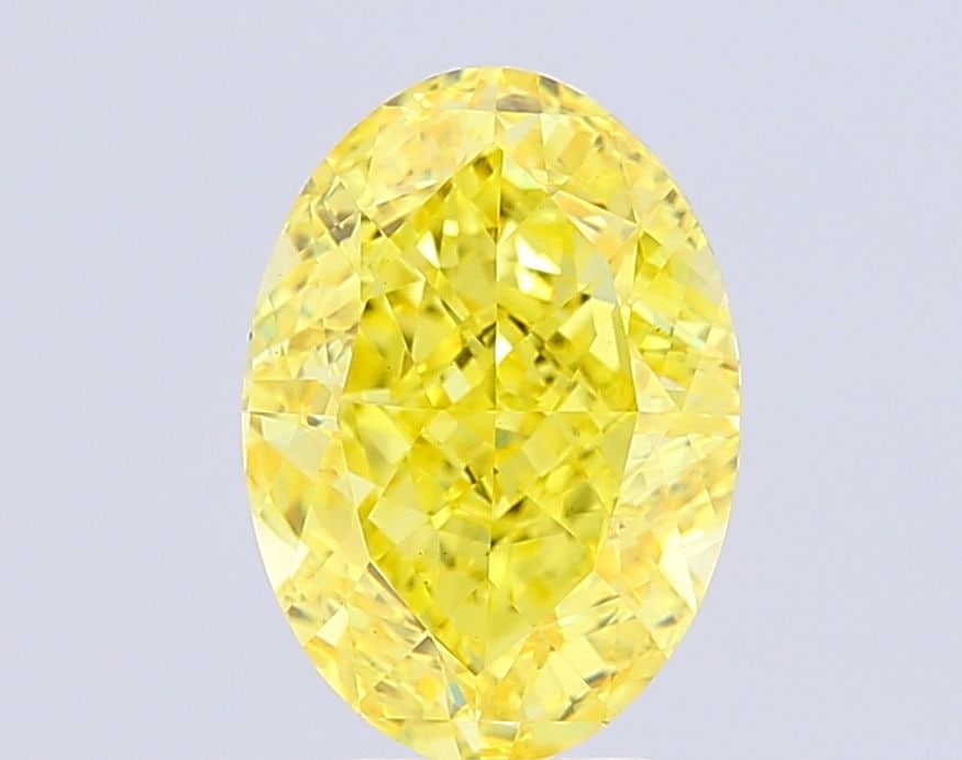 Loose Diamond - OVAL 5.7ct Fancy Vivid Yellow VS1: Loose Diamond - OVAL 5.7ct Fancy Vivid Yellow VS1 Source: This is a real non-mined Diamond that has been grown in a lab Shape: OVAL Carats: 5.7 Color: Fancy Vivid Yellow Certification: IGI Video:
