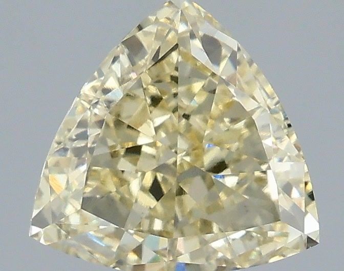 Loose Diamond - TRIANGULAR 2.07ct Fancy Yellow VS1: Loose Diamond - TRIANGULAR 2.07ct Fancy Yellow VS1 Source: This is a real non-mined Diamond that has been grown in a lab Shape: TRIANGULAR Carats: 2.07 Color: Fancy Yellow Certification: IGI Video: