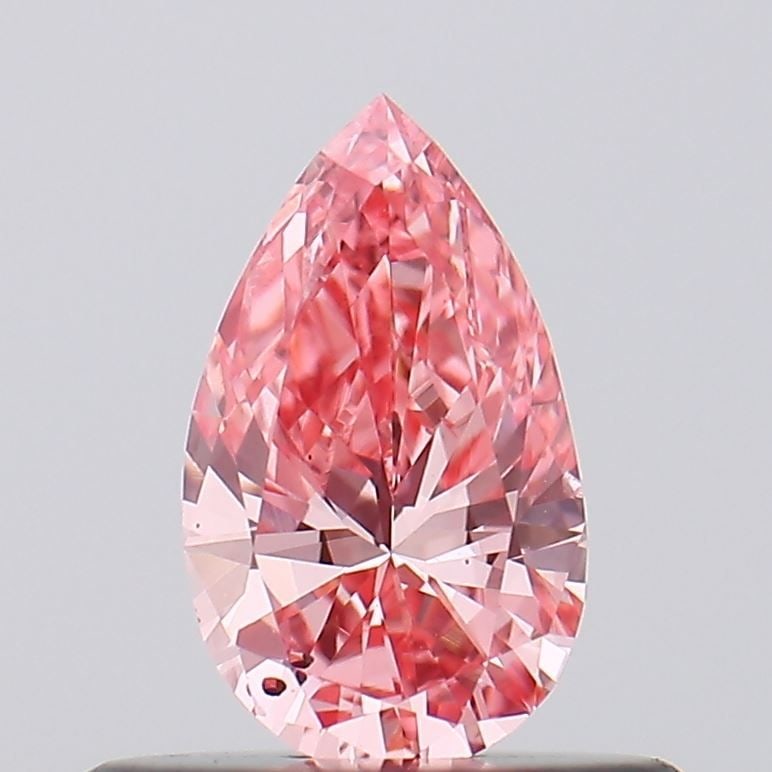 Loose Diamond - PEAR 0.37ct Fancy Vivid Pink VS2: Loose Diamond - PEAR 0.37ct Fancy Vivid Pink VS2 Source: This is a real non-mined Diamond that has been grown in a lab Shape: PEAR Carats: 0.37 Color: Fancy Vivid Pink Certification: IGI Video: