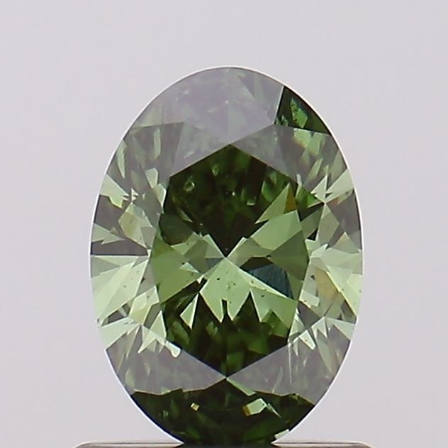 Loose Diamond - OVAL 0.72ct Fancy Vivid Green SI1: Loose Diamond - OVAL 0.72ct Fancy Vivid Green SI1 Source: This is a real non-mined Diamond that has been grown in a lab Shape: OVAL Carats: 0.72 Color: Fancy Vivid Green Certification: NONE Video: