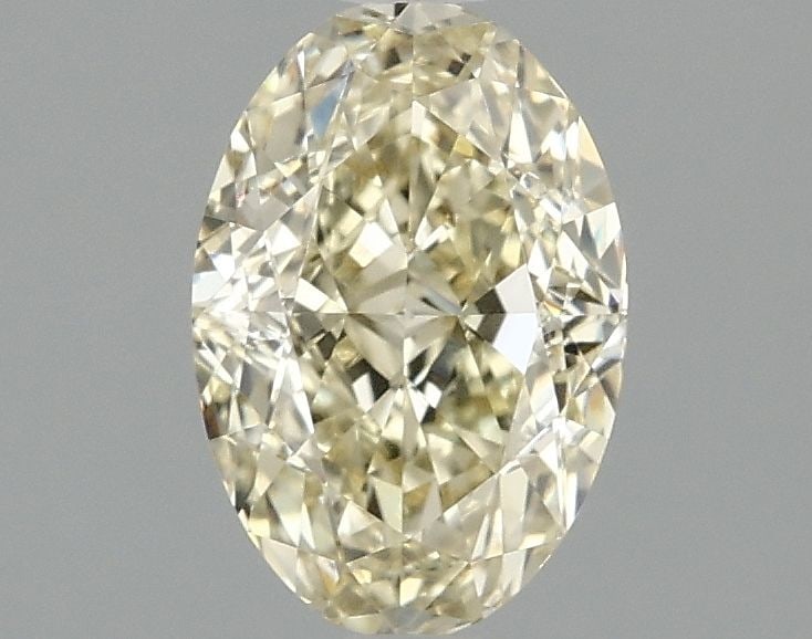 Loose Diamond - OVAL 1.59ct Fancy Yellow VVS2: Loose Diamond - OVAL 1.59ct Fancy Yellow VVS2 Source: This is a real non-mined Diamond that has been grown in a lab Shape: OVAL Carats: 1.59 Color: Fancy Yellow Certification: IGI Video:
