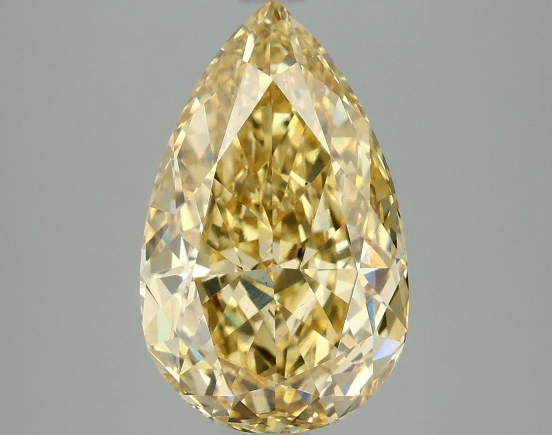 Loose Diamond - PEAR 4.06ct Fancy Vivid Yellow VS1: Loose Diamond - PEAR 4.06ct Fancy Vivid Yellow VS1 Source: This is a real non-mined Diamond that has been grown in a lab Shape: PEAR Carats: 4.06 Color: Fancy Vivid Yellow Certification: IGI Video: