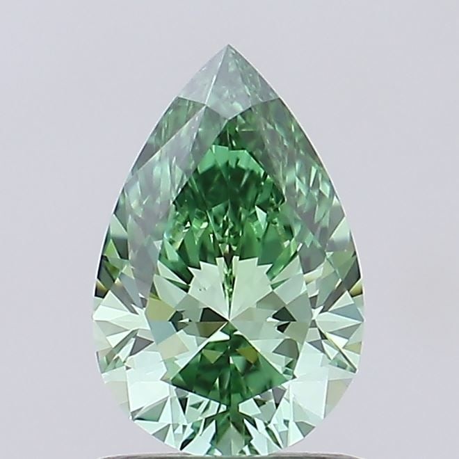 Loose Diamond - PEAR 0.79ct Fancy Vivid Green VVS2: Loose Diamond - PEAR 0.79ct Fancy Vivid Green VVS2 Source: This is a real non-mined Diamond that has been grown in a lab Shape: PEAR Carats: 0.79 Color: Fancy Vivid Green Certification: IGI Additional