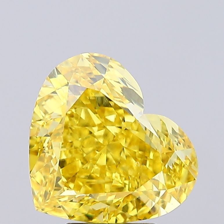 Loose Diamond - HEART 6.12ct Fancy Vivid Yellow VS2: Loose Diamond - HEART 6.12ct Fancy Vivid Yellow VS2 Source: This is a real non-mined Diamond that has been grown in a lab Shape: HEART Carats: 6.12 Color: Fancy Vivid Yellow Certification: IGI Video: