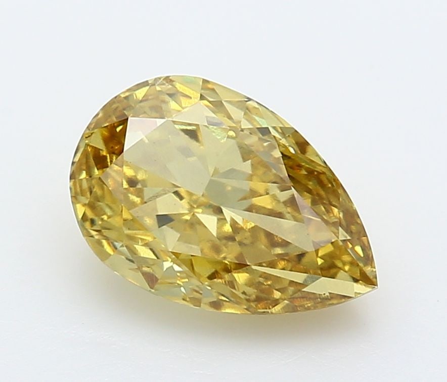 Loose Diamond - PEAR 3.14ct Fancy Vivid Yellow VS1: Loose Diamond - PEAR 3.14ct Fancy Vivid Yellow VS1 Source: This is a real non-mined Diamond that has been grown in a lab Shape: PEAR Carats: 3.14 Color: Fancy Vivid Yellow Certification: IGI Video: