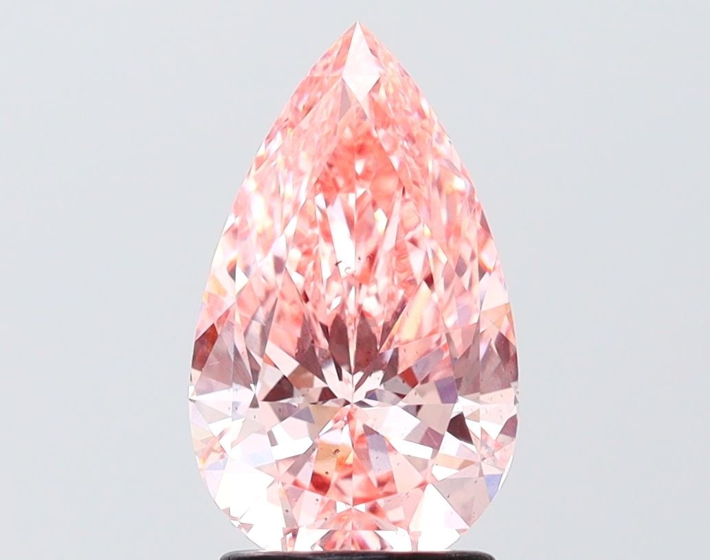 Loose Diamond - PEAR 2.07ct Fancy Vivid Pink SI1: Loose Diamond - PEAR 2.07ct Fancy Vivid Pink SI1 Source: This is a real non-mined Diamond that has been grown in a lab Shape: PEAR Carats: 2.07 Color: Fancy Vivid Pink Certification: IGI Video: