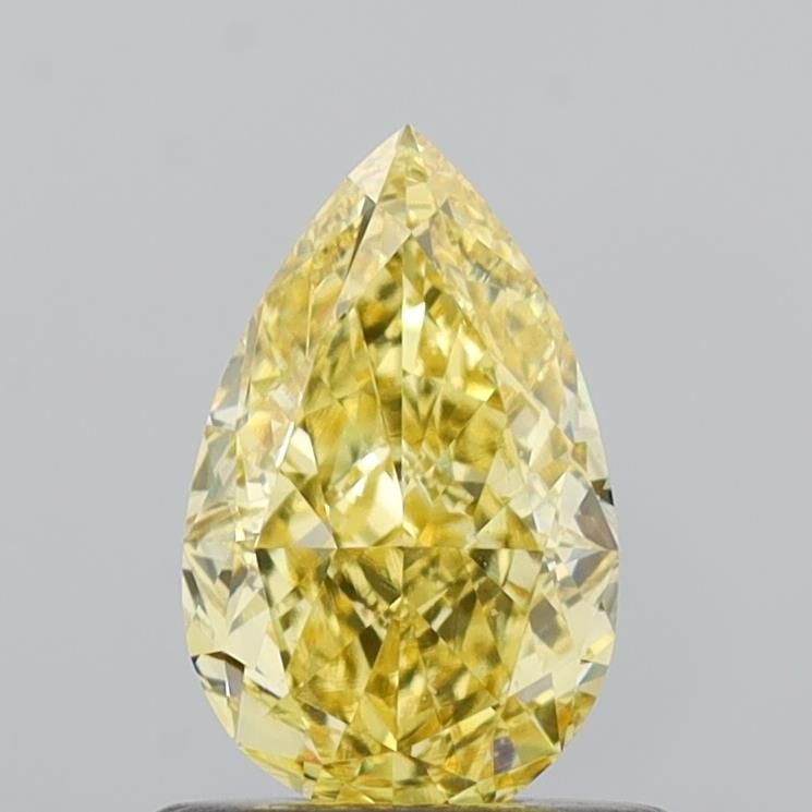 Loose Diamond - PEAR 0.86ct Fancy Intense Yellow VVS2: Loose Diamond - PEAR 0.86ct Fancy Intense Yellow VVS2 Source: This is a real non-mined Diamond that has been grown in a lab Shape: PEAR Carats: 0.86 Color: Fancy Intense Yellow Certification: IGI Vide