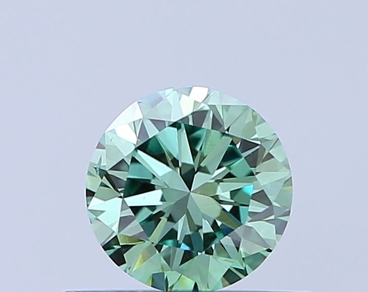 Loose Diamond - ROUND 0.45ct Fancy Vivid Green VS2: Loose Diamond - ROUND 0.45ct Fancy Vivid Green VS2 Source: This is a real non-mined Diamond that has been grown in a lab Shape: ROUND Carats: 0.45 Color: Fancy Vivid Green Certification: IGI Video: