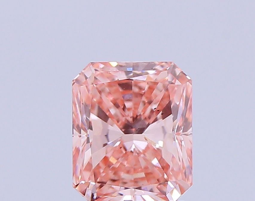 Loose Diamond - RADIANT 1.5ct Fancy Vivid Pink VS2: Loose Diamond - RADIANT 1.5ct Fancy Vivid Pink VS2 Source: This is a real non-mined Diamond that has been grown in a lab Shape: RADIANT Carats: 1.5 Color: Fancy Vivid Pink Certification: IGI Video: