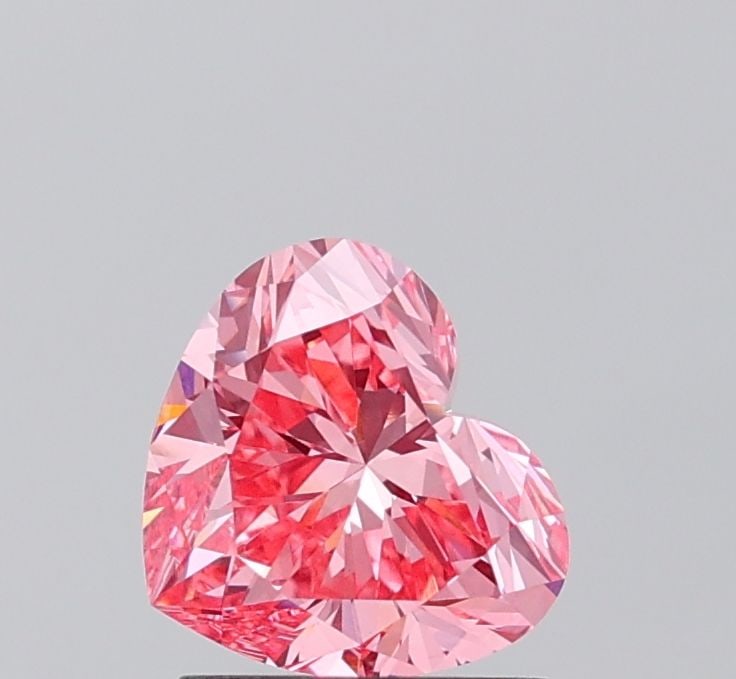 Loose Diamond - HEART 1.3ct Fancy Vivid Pink VVS2: Loose Diamond - HEART 1.3ct Fancy Vivid Pink VVS2 Source: This is a real non-mined Diamond that has been grown in a lab Shape: HEART Carats: 1.3 Color: Fancy Vivid Pink Certification: IGI Additional i