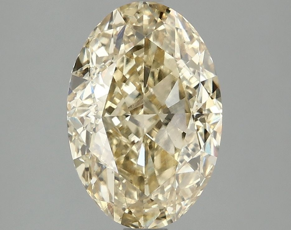 Loose Diamond - OVAL 3.1ct Fancy Vivid Yellow VS1: Loose Diamond - OVAL 3.1ct Fancy Vivid Yellow VS1 Source: This is a real non-mined Diamond that has been grown in a lab Shape: OVAL Carats: 3.1 Color: Fancy Vivid Yellow Certification: IGI Video: