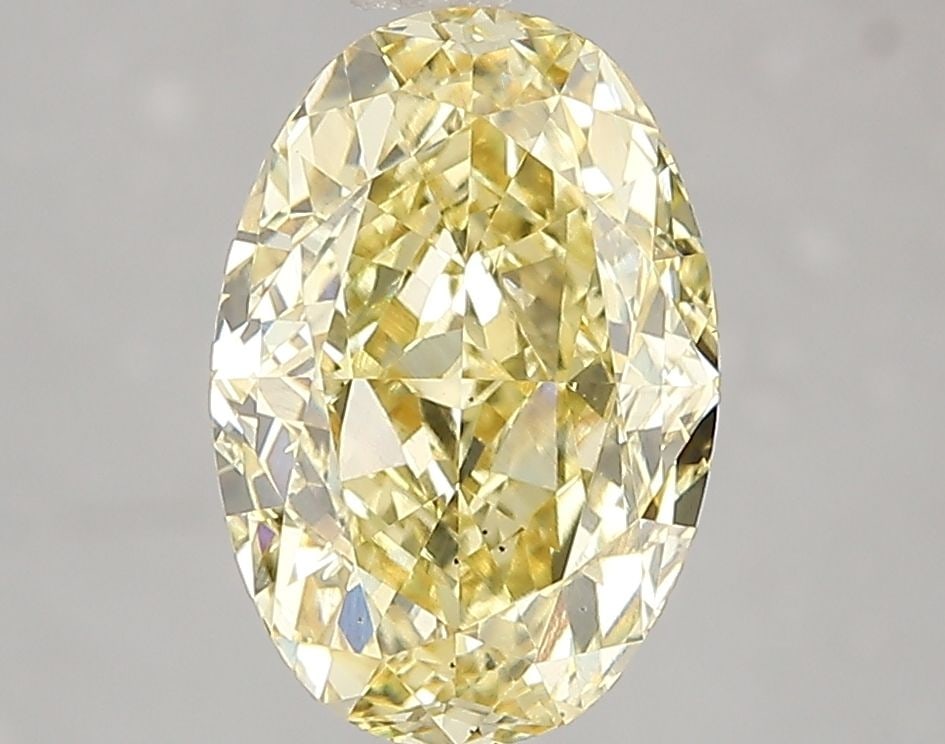 Loose Diamond - OVAL 3.02ct Fancy Vivid Yellow VS2: Loose Diamond - OVAL 3.02ct Fancy Vivid Yellow VS2 Source: This is a real non-mined Diamond that has been grown in a lab Shape: OVAL Carats: 3.02 Color: Fancy Vivid Yellow Certification: IGI Video: