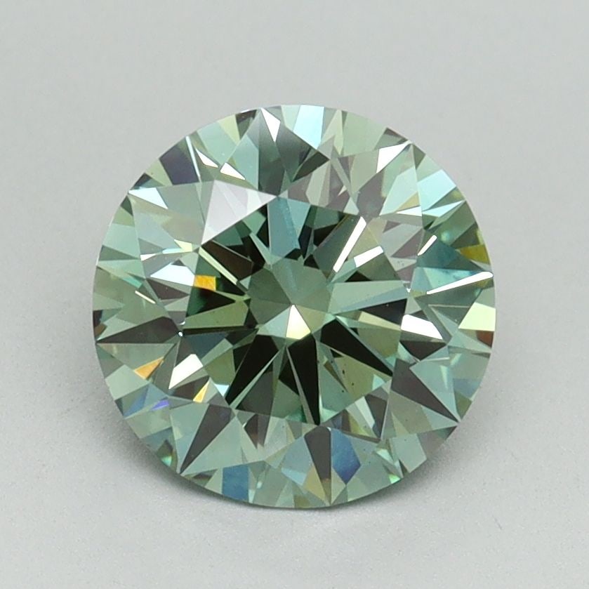Ideal Loose Diamond - ROUND 1.71ct Fancy Vivid Green VS1: Ideal Loose Diamond - ROUND 1.71ct Fancy Vivid Green VS1 Source: This is a real non-mined Diamond that has been grown in a lab Shape: ROUND Carats: 1.71 Color: Fancy Vivid Green Certification: IGI Vid